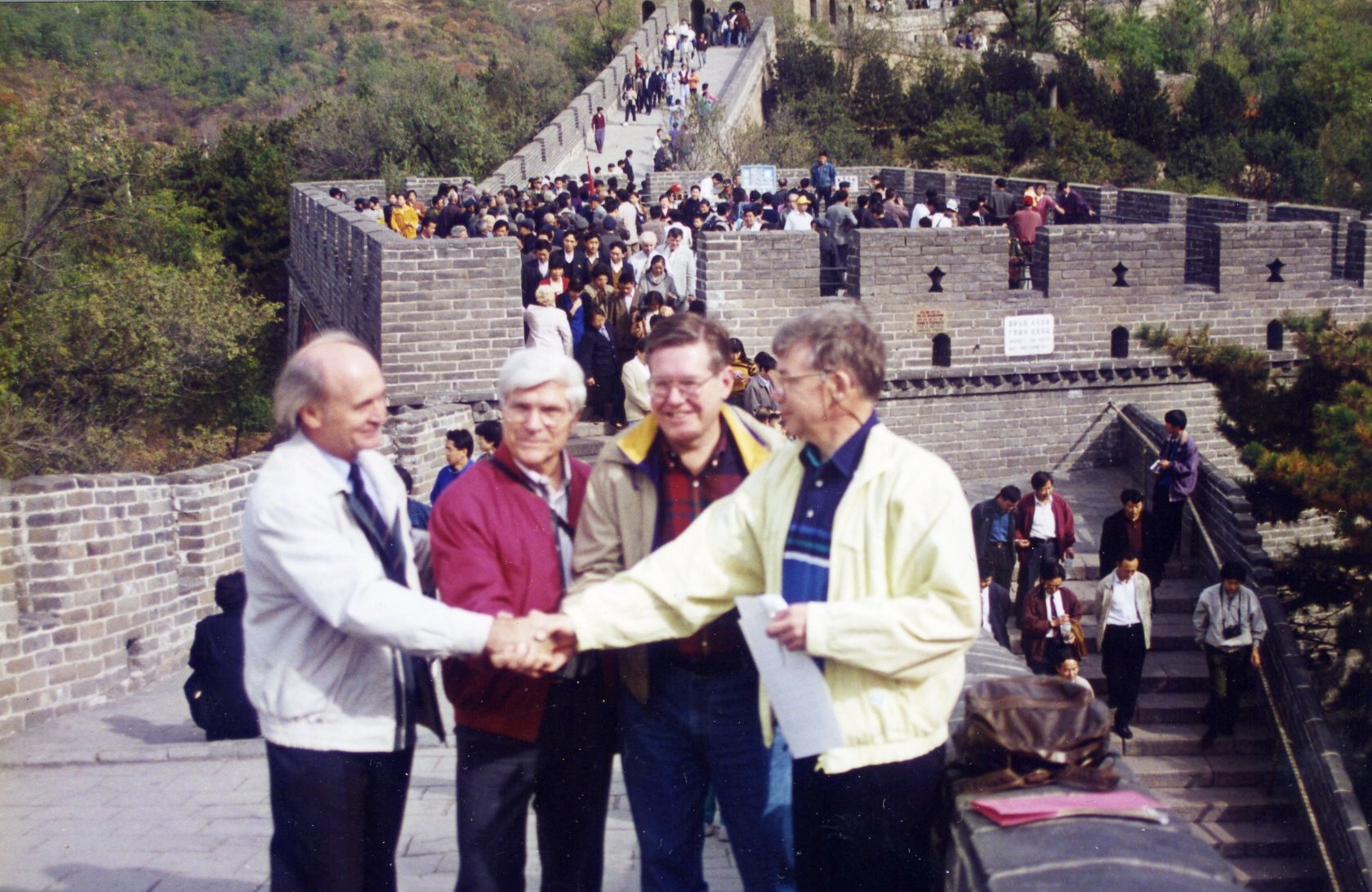 Handshaking on the Great Wall of China by the Signatories of the WHO Declaration on Occupational Health for All.